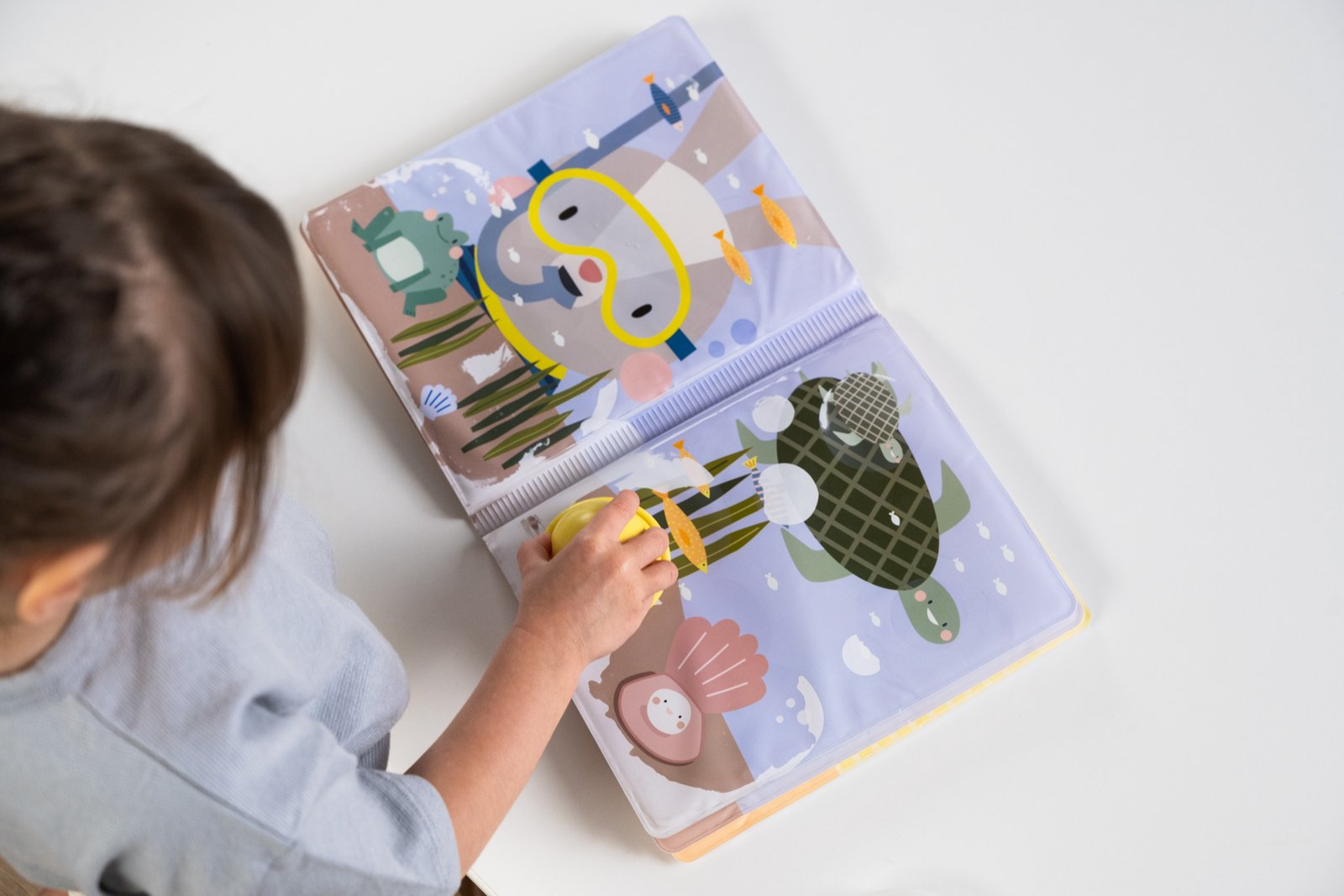 Libro de agua Peek-a-boo Taf Toys - Imagen 4